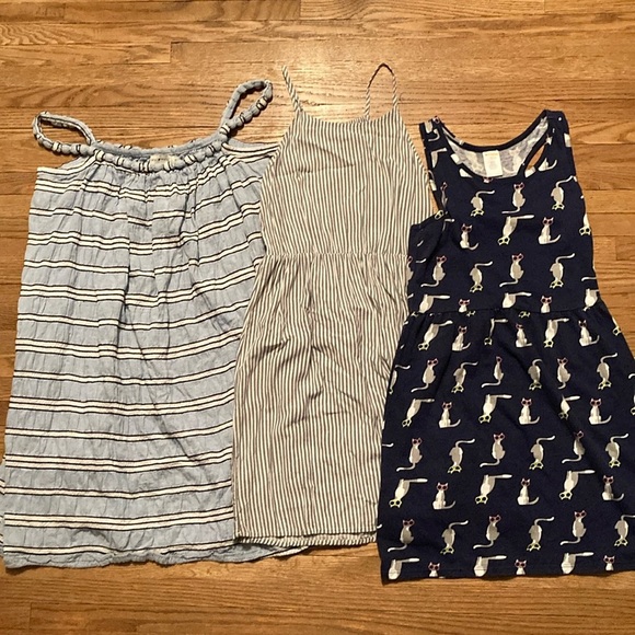Size 10 dresses. The blue stripe one is size 12-14. All in great shape. - Picture 1 of 7